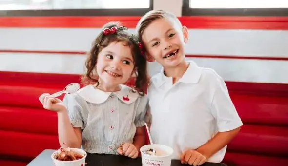 Guest photo of children enjoying custard